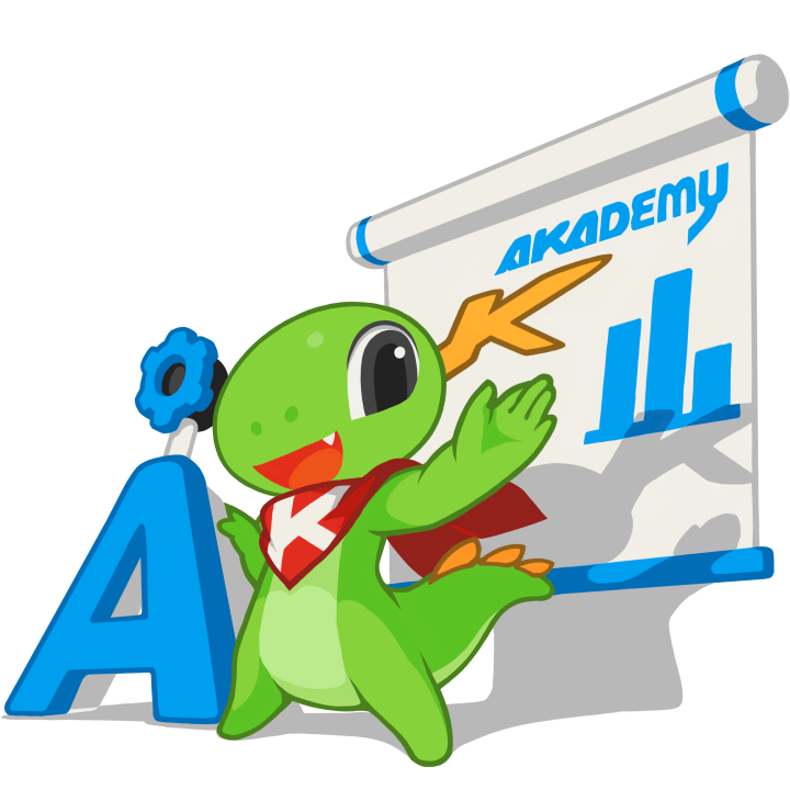 Konqi apuntando a una pizarra que pone Akademy